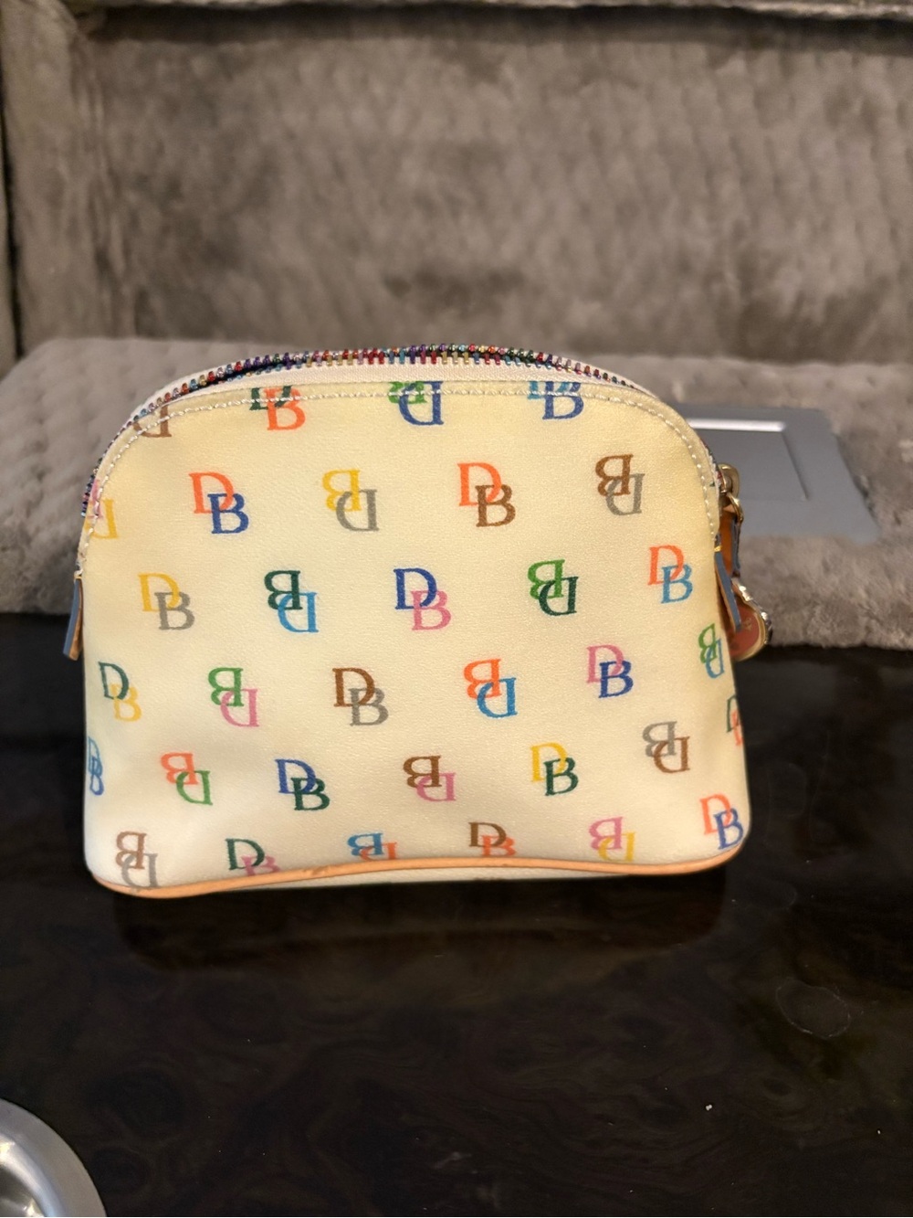 Dooney & Bourke Cream Cosmetic Pouch with Multicolor DB Print